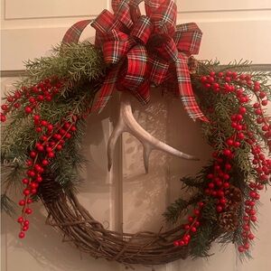 Rustic Holiday Wreath with Plaid Bow and Red Berries